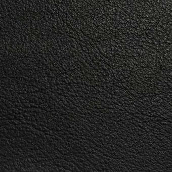 Rugiano S5001 leather rug, black matte finish, exhibiting a dense granular texture and tightly woven, uniform surface.